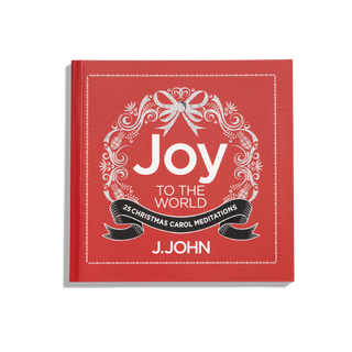 A red book cover with the title 'Joy to the World: 25 Christmas Carol Meditations' by J.John.